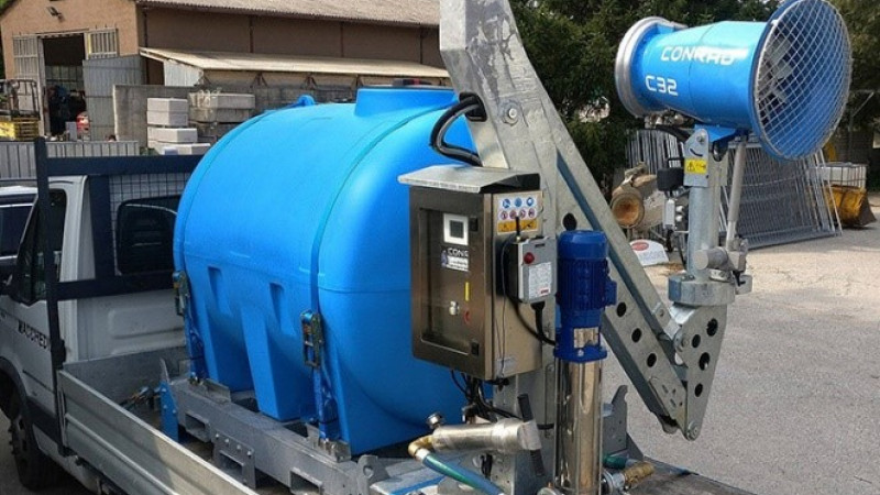 Sanitary treatment of open spaces with fog generation systems