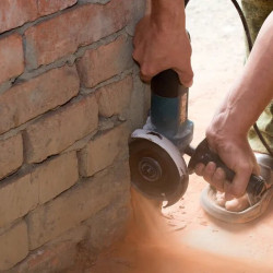 Cutting grooves in brick, linear meters