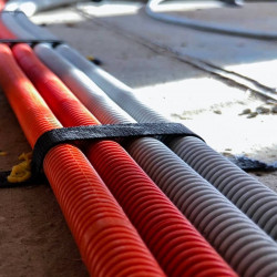 Wiring of cable in corrugated conduit, linear meter