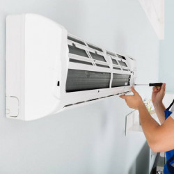 Installation of a 30 BTU air conditioner, unit.