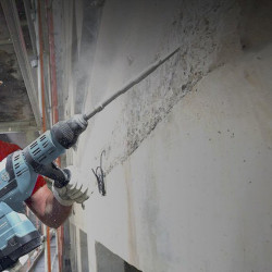 Dismantling of cement-sand plaster, m²