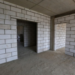 Construction of partitions using slag blocks, gas blocks, and foam blocks, unit.