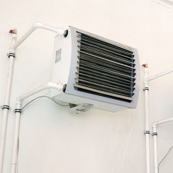 Instalación de calefactor, unidad.