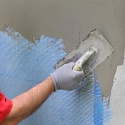 Installation of mesh in plaster on walls, m²