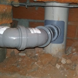 Tapping into the main sewer line, unit.