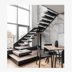 Modern staircase design with dark oak balustrade