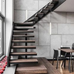 Modern staircase design with dark oak balustrade