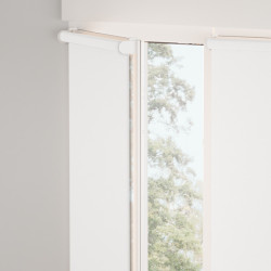 Fabric roller with blackout fabric on the window