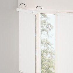 Fabric roller with blackout fabric on the window