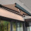 SmartSun canopy complete with motor and acrylic canvas LED 3x2 m gray stone color. Canopy for terrace, balcony, wall brackets included